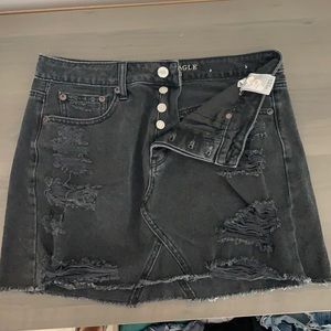 Distressed denim mini skirt